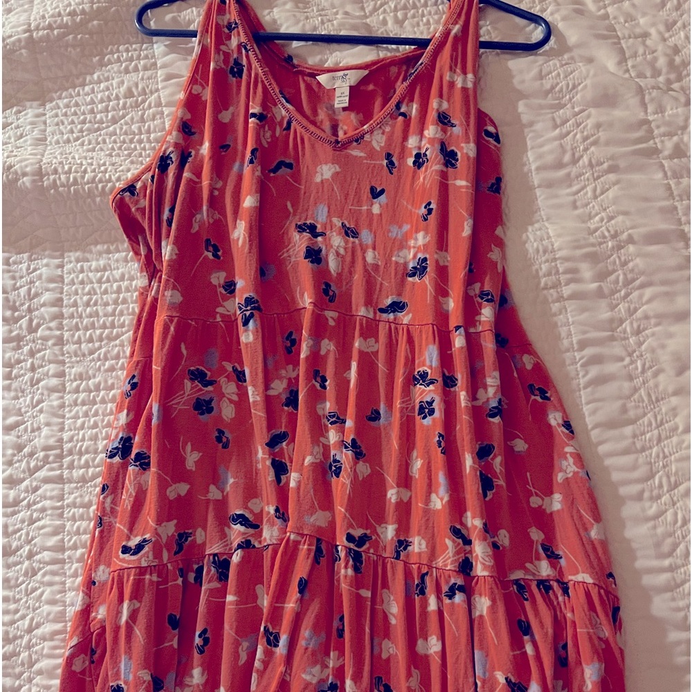 Lightweight orange sleeveless summer dress.
